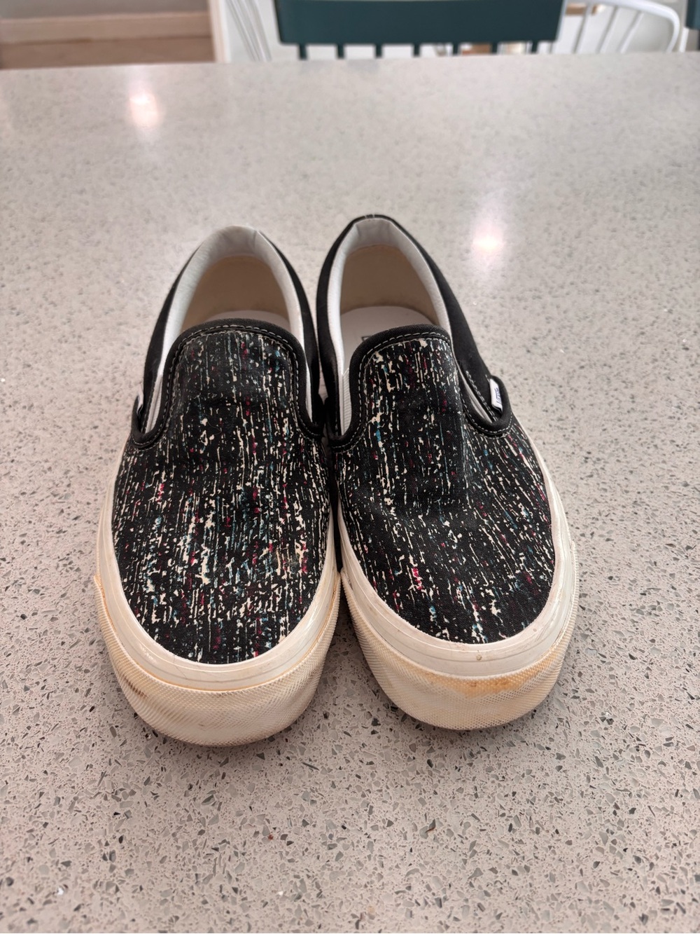 Vans Black Slip-On Sneakers with Multicolor Speckle
